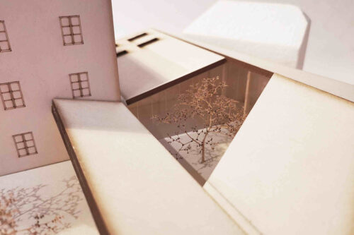 Modellfoto des Innenhofs mit Baum